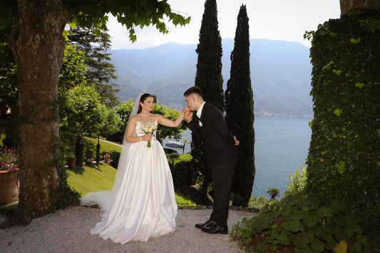 Luxury destination wedding photographer in Lake Como capturing an elegant bride and groom at an Italian villa