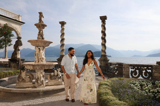 Bride and groom walking through the botanical gardens of Villa Monastero and Villa Cipressi in Varenna, Lake Como