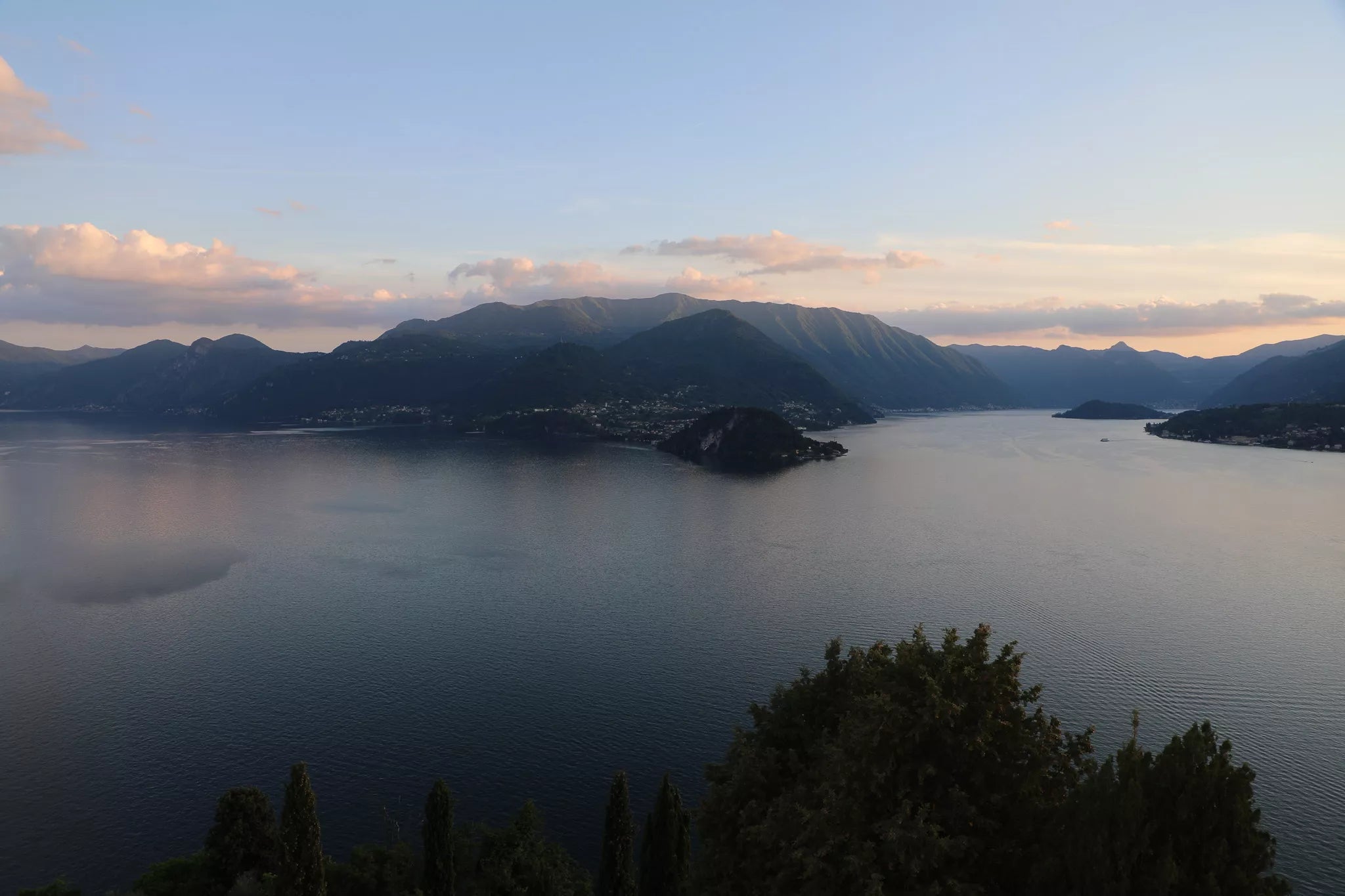 Castello di Vezio proposal photographer capturing a couple above Varenna with panoramic Lake Como views