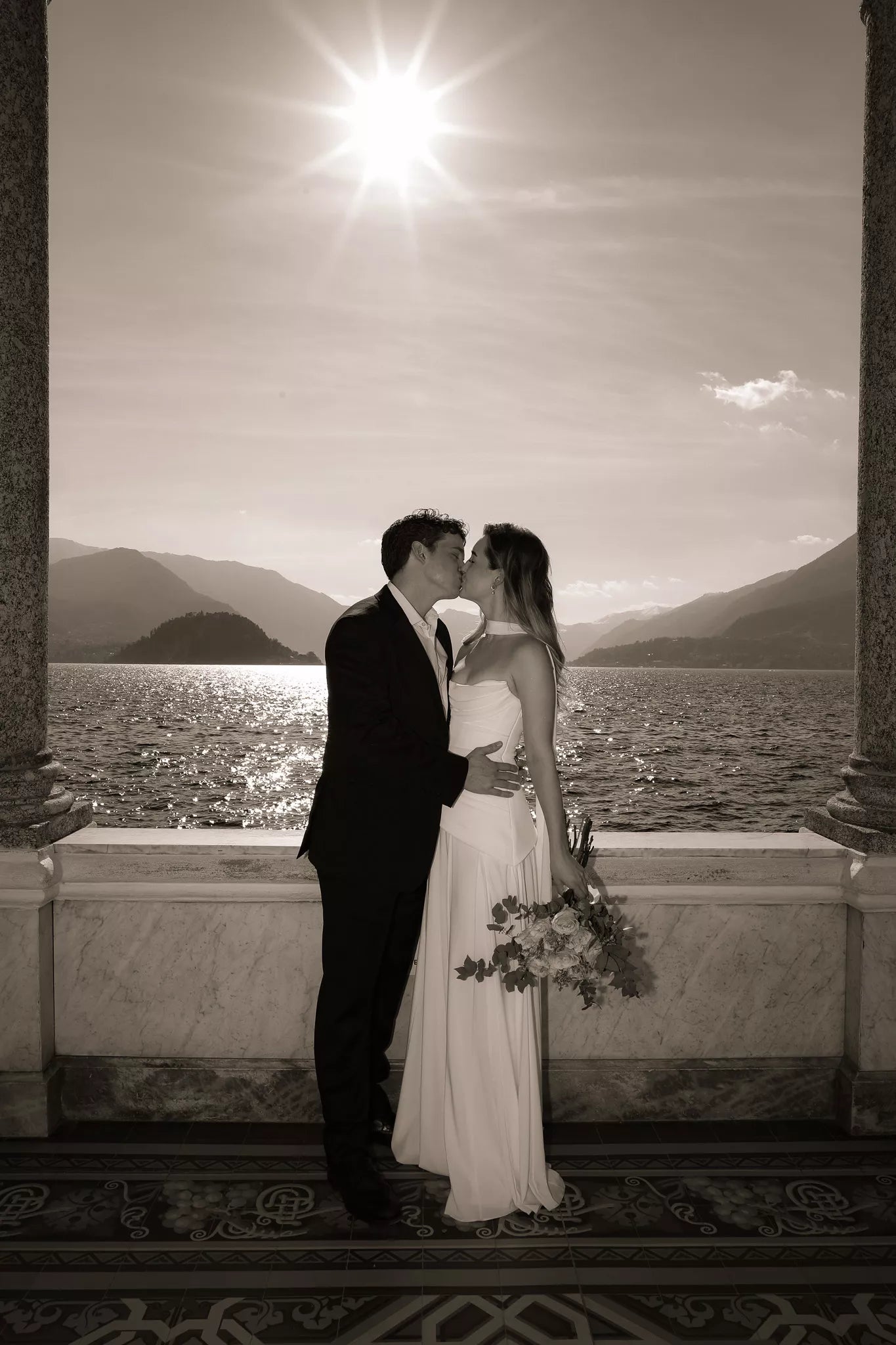 Italian Lake Como proposal styling package with elegant dress, floral bouquet, shoes, and cinematic photography