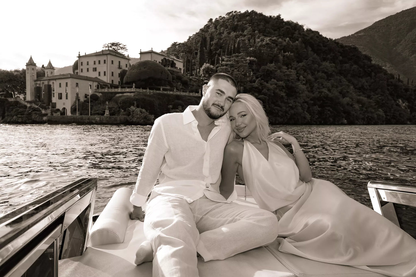 Engagement photography on a boat on Lake Como with panoramic lake views