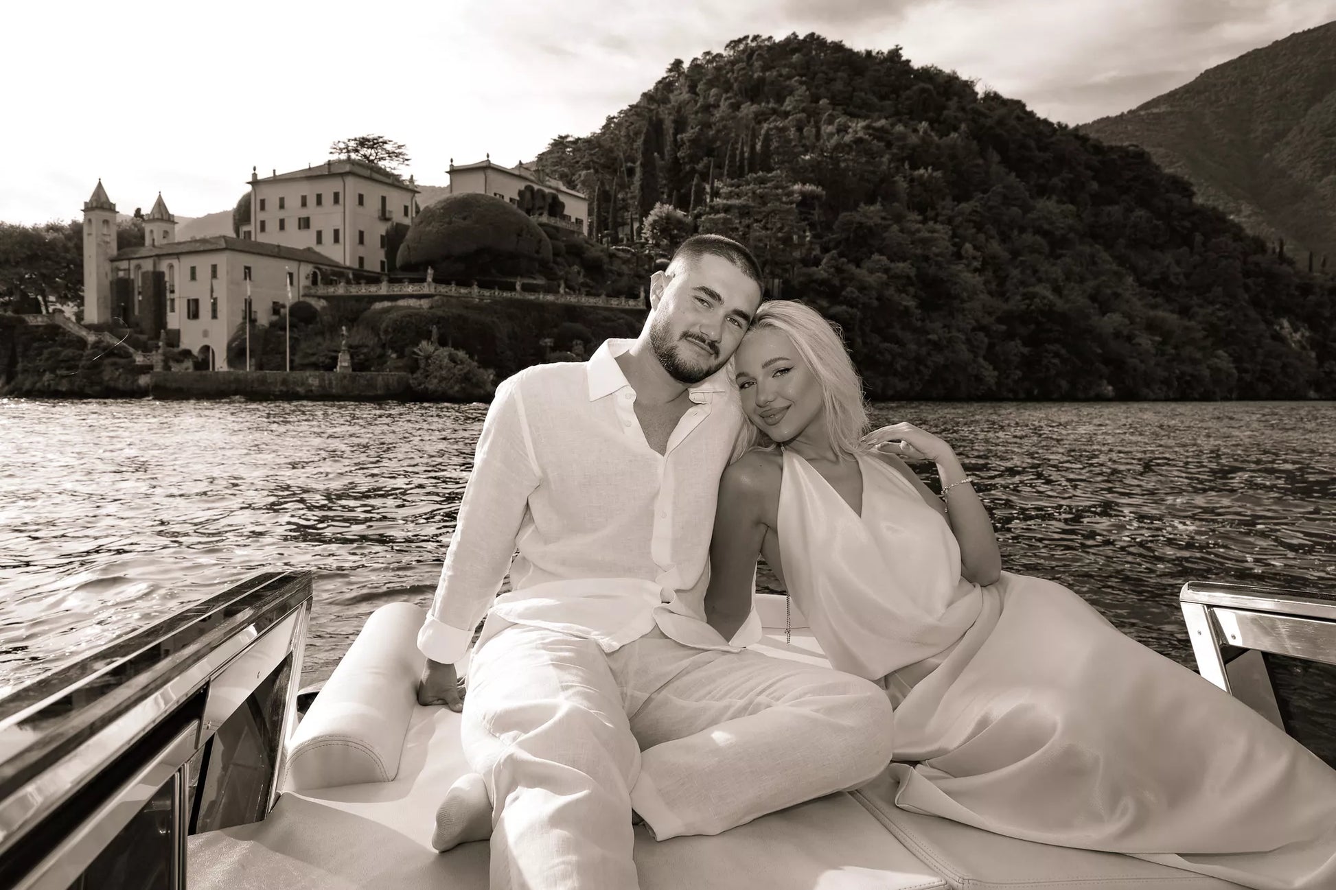 Engagement photography on a boat on Lake Como with panoramic lake views