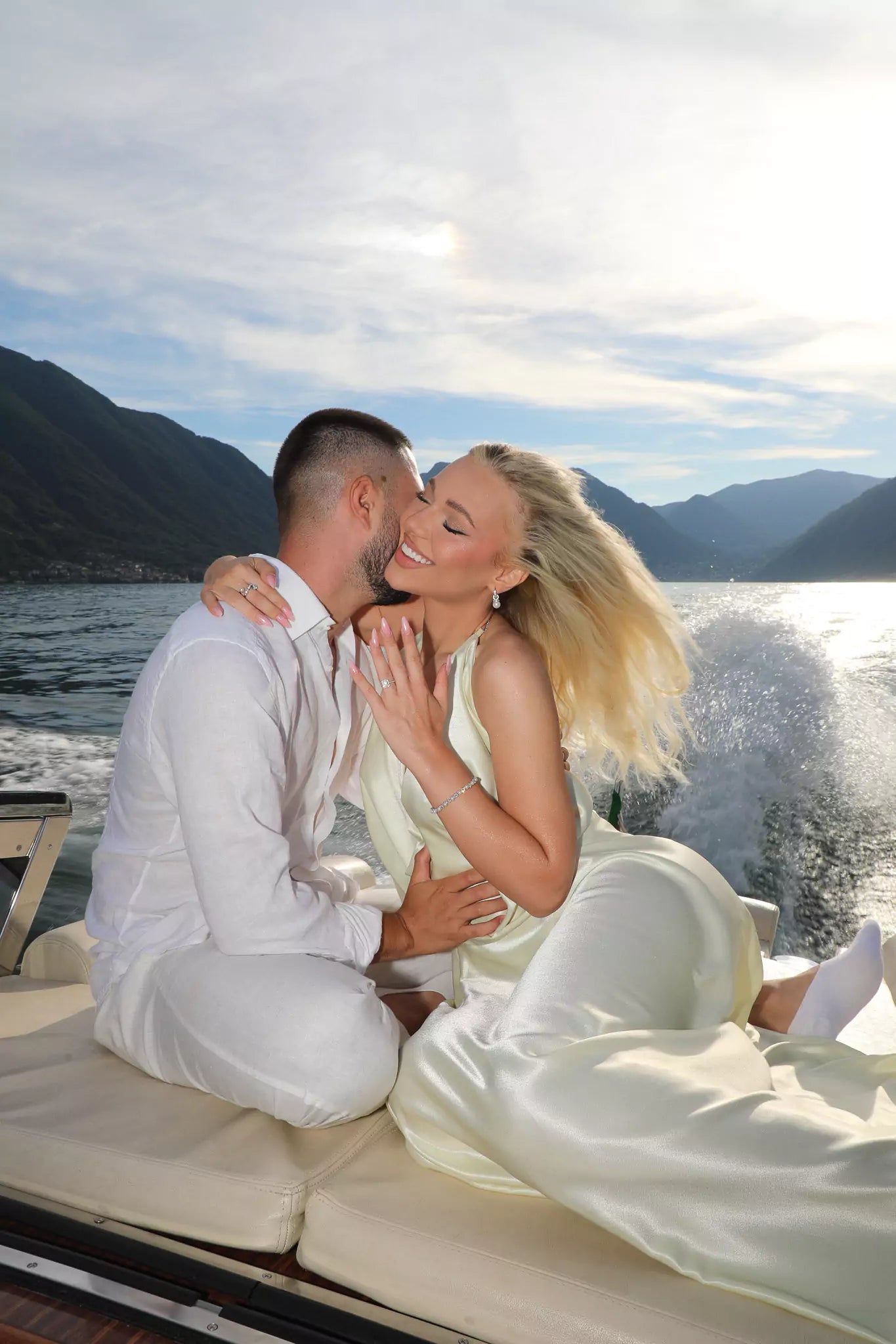 Lake Como engagement photography on a private wooden boat at sunset