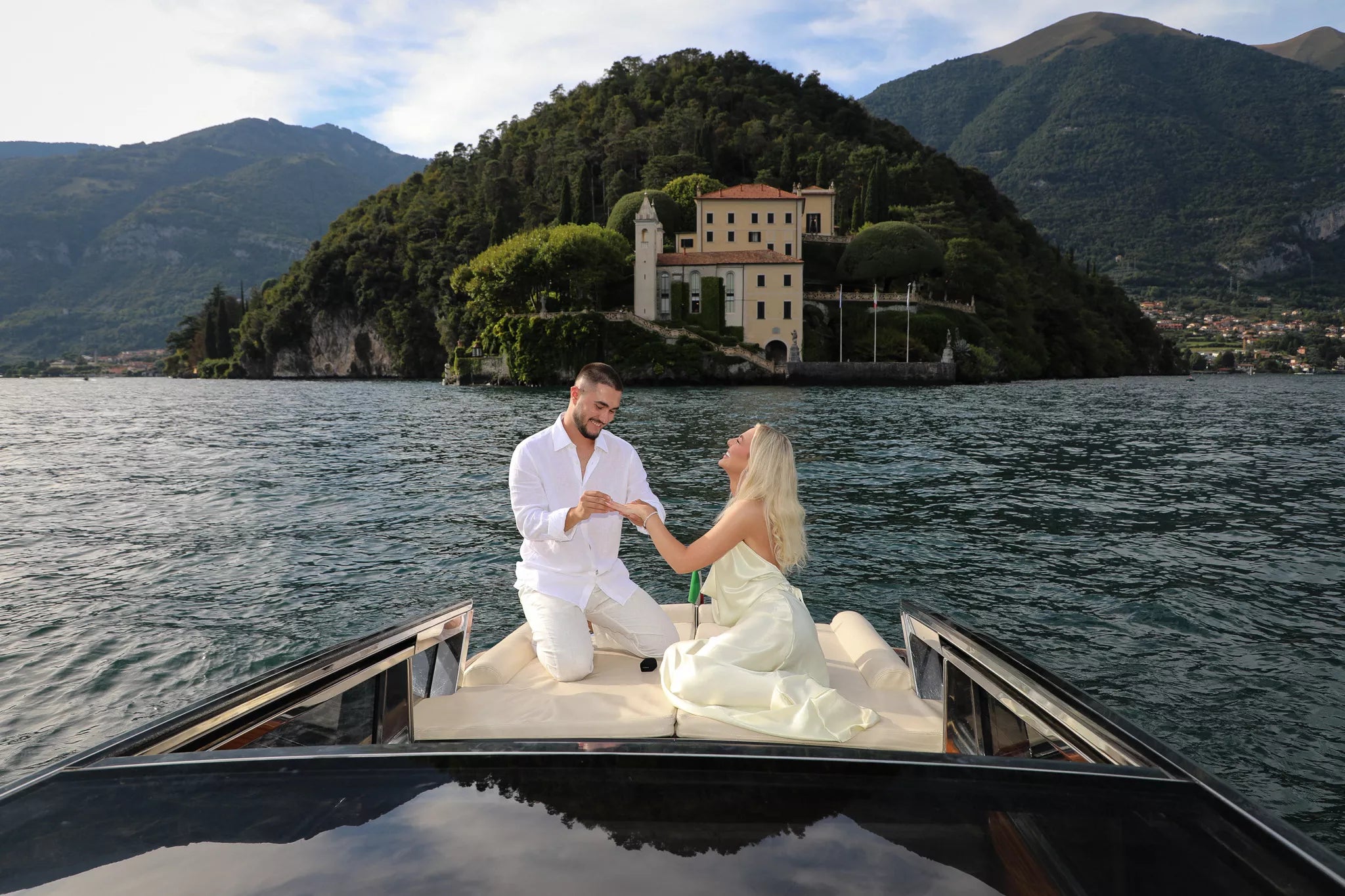 Close-up of engagement ring during a surprise private boat proposal on Lake Como