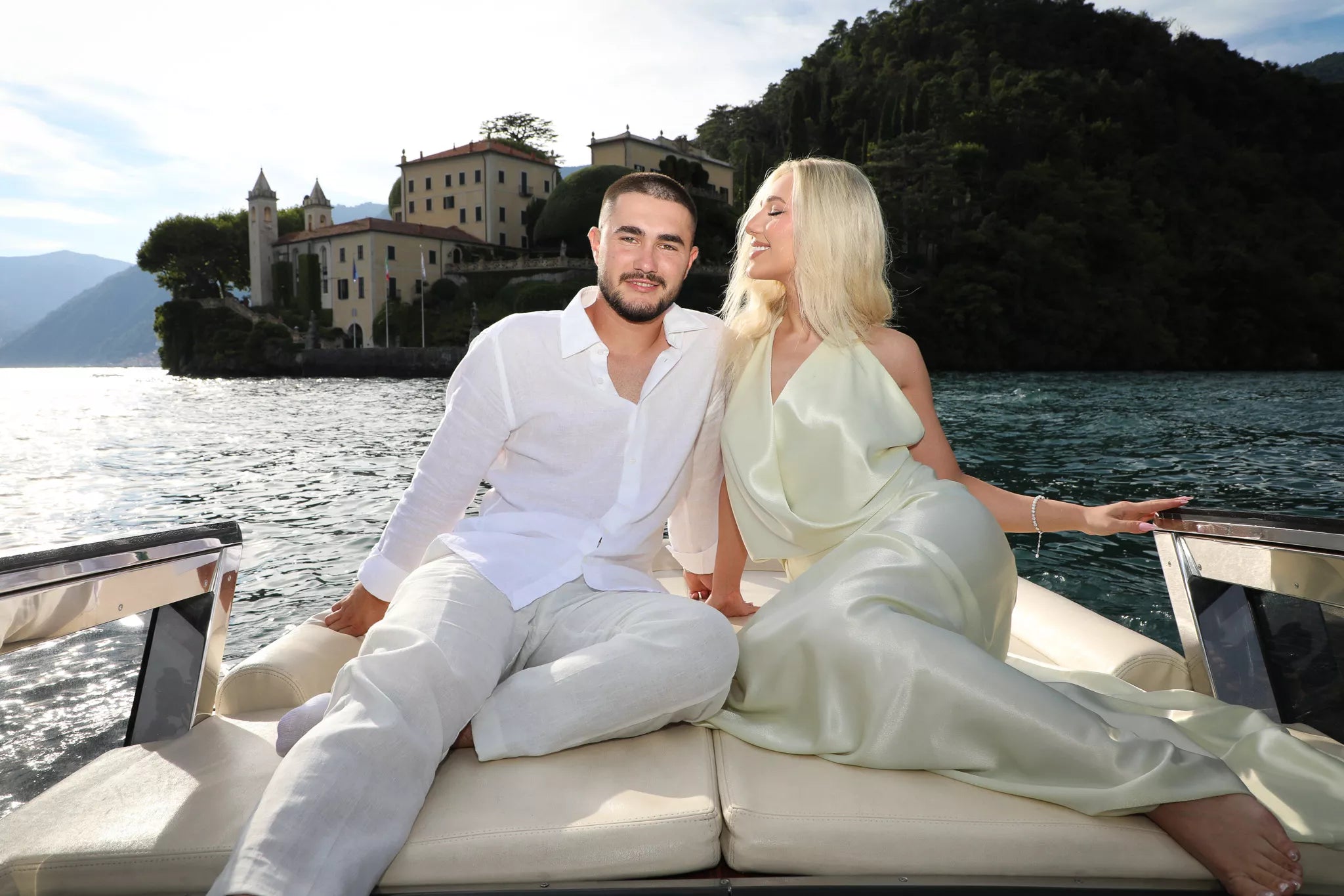 Romantic Lake Como private boat cruise at golden hour before a surprise proposal