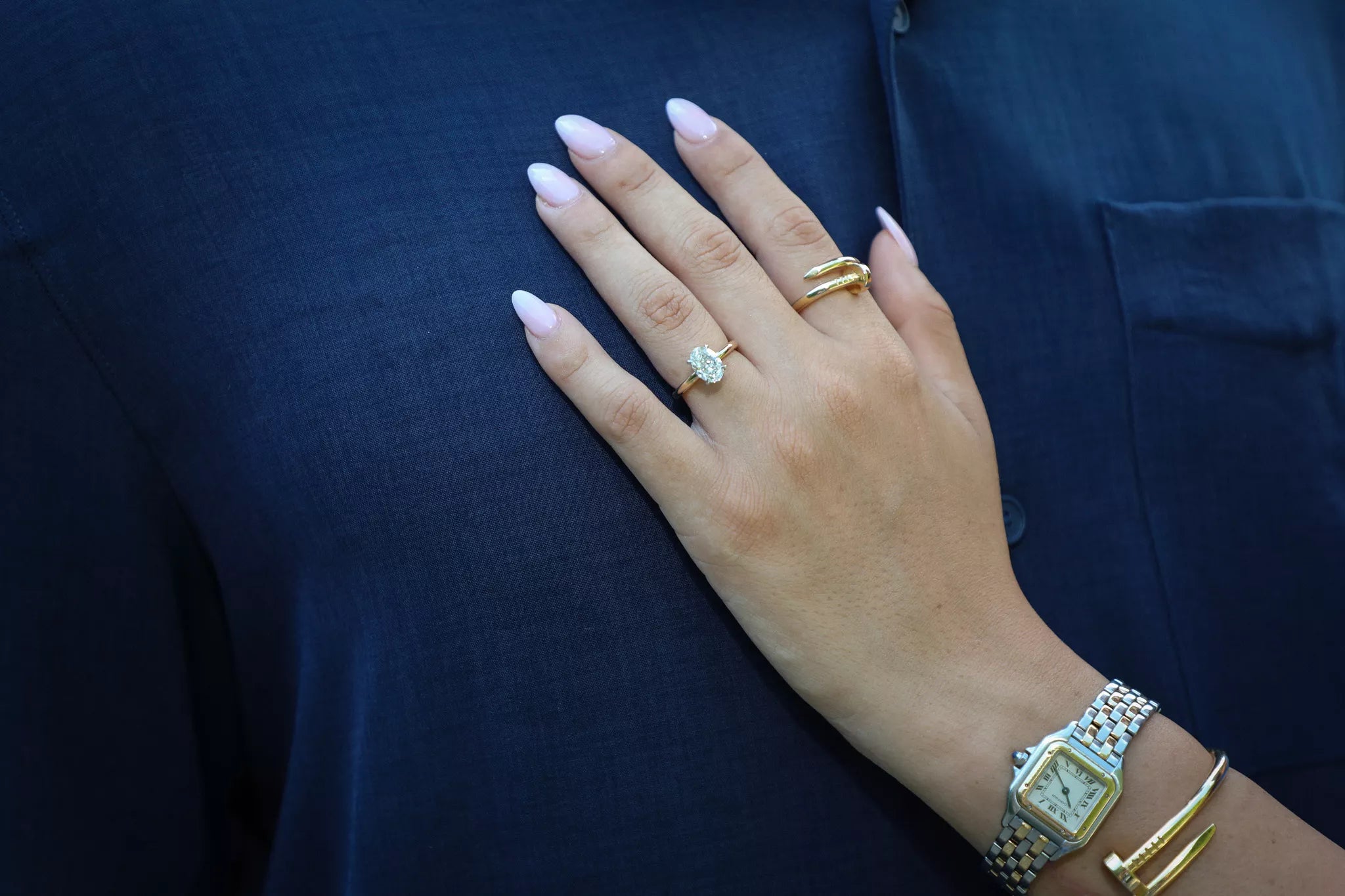 Close-up detail of an engagement ring during a surprise Bellagio proposal on Lake Como captured by photographer Nadia Fraqair