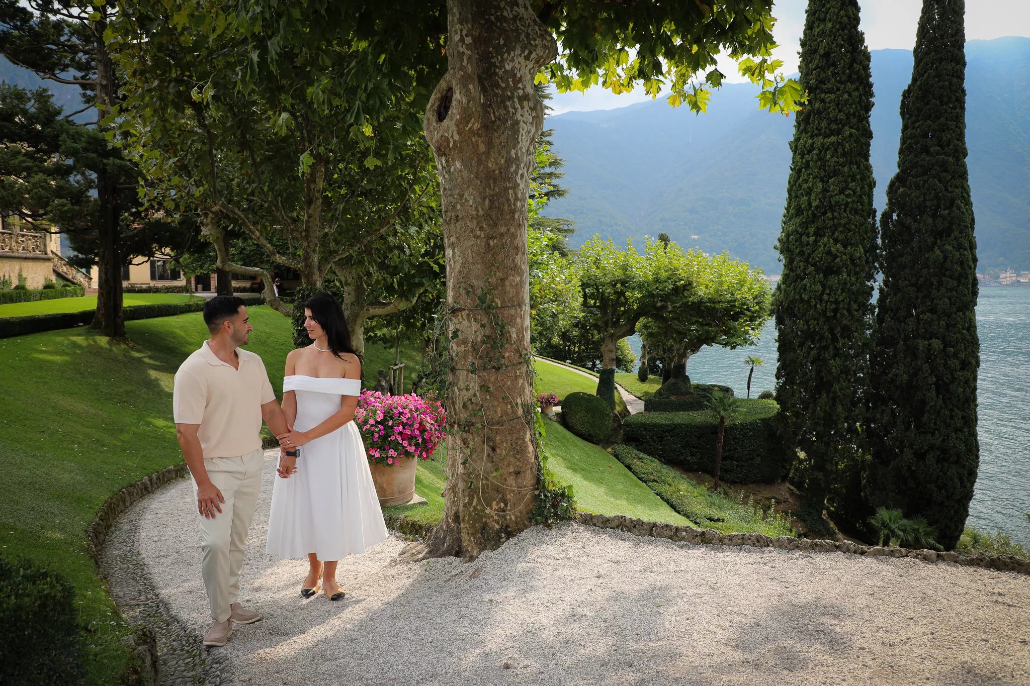 Lake Como proposal dress package with designer dress shoes bouquet and romantic proposal photography