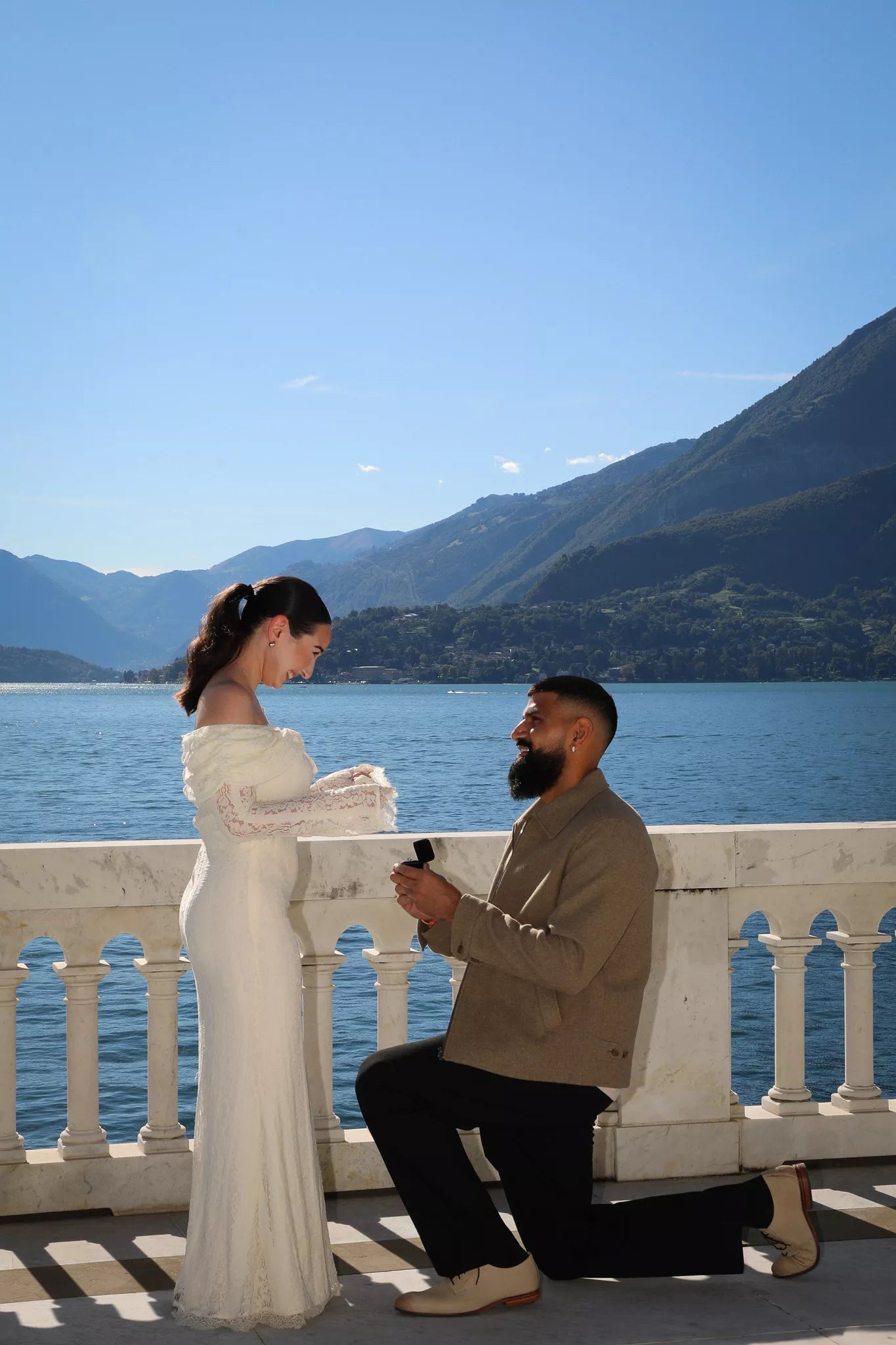 Emotional proposal kneeling moment by the lake — luxury Lake Como engagement film.