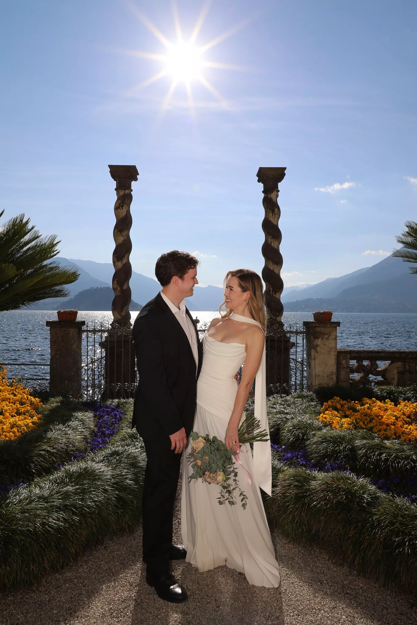 Lake Como proposal outfit with dress, shoes, bouquet, and professional engagement photography for a romantic proposal package