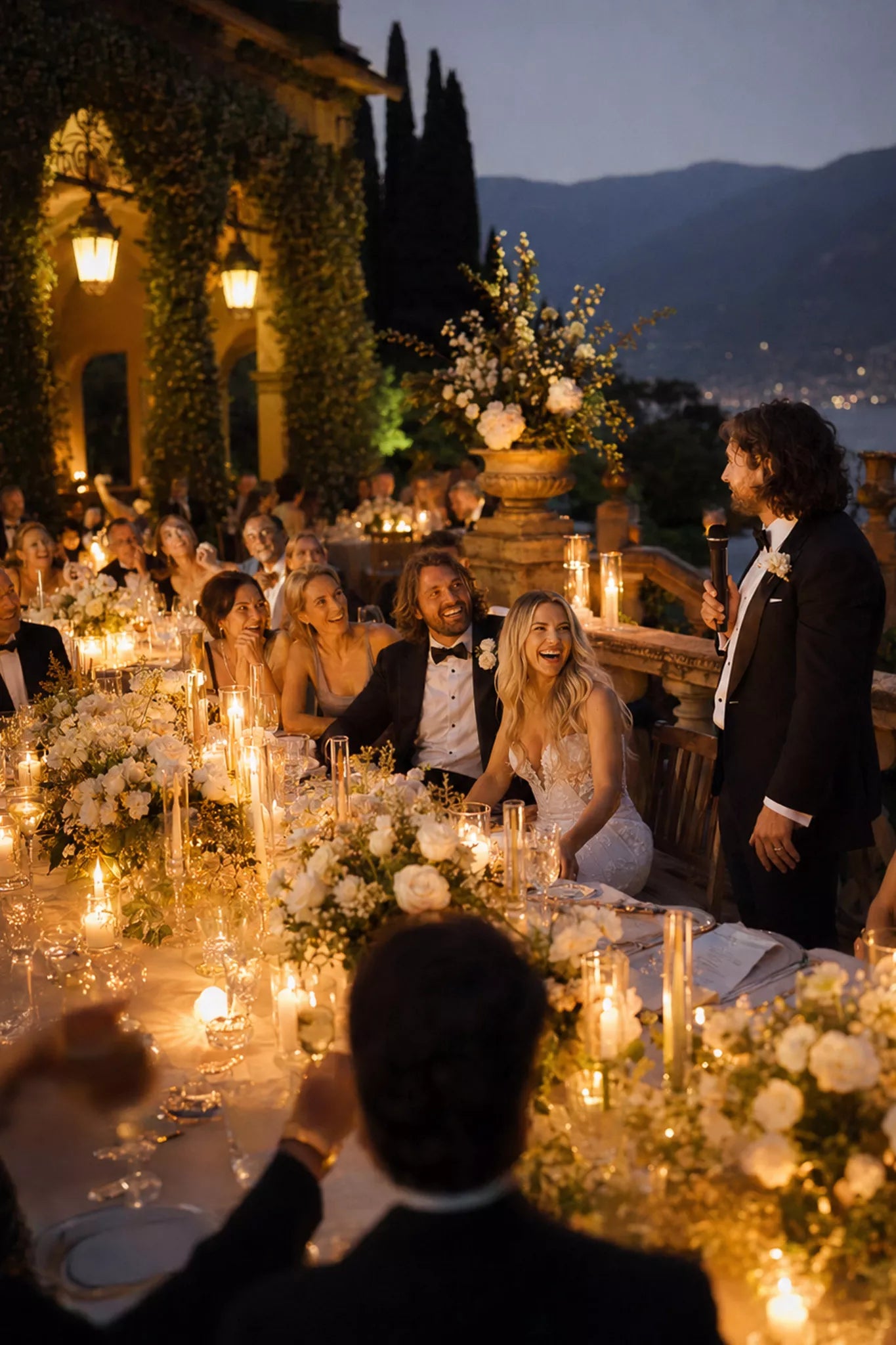 Candlelit Lake Como wedding reception photographed by luxury wedding photographer