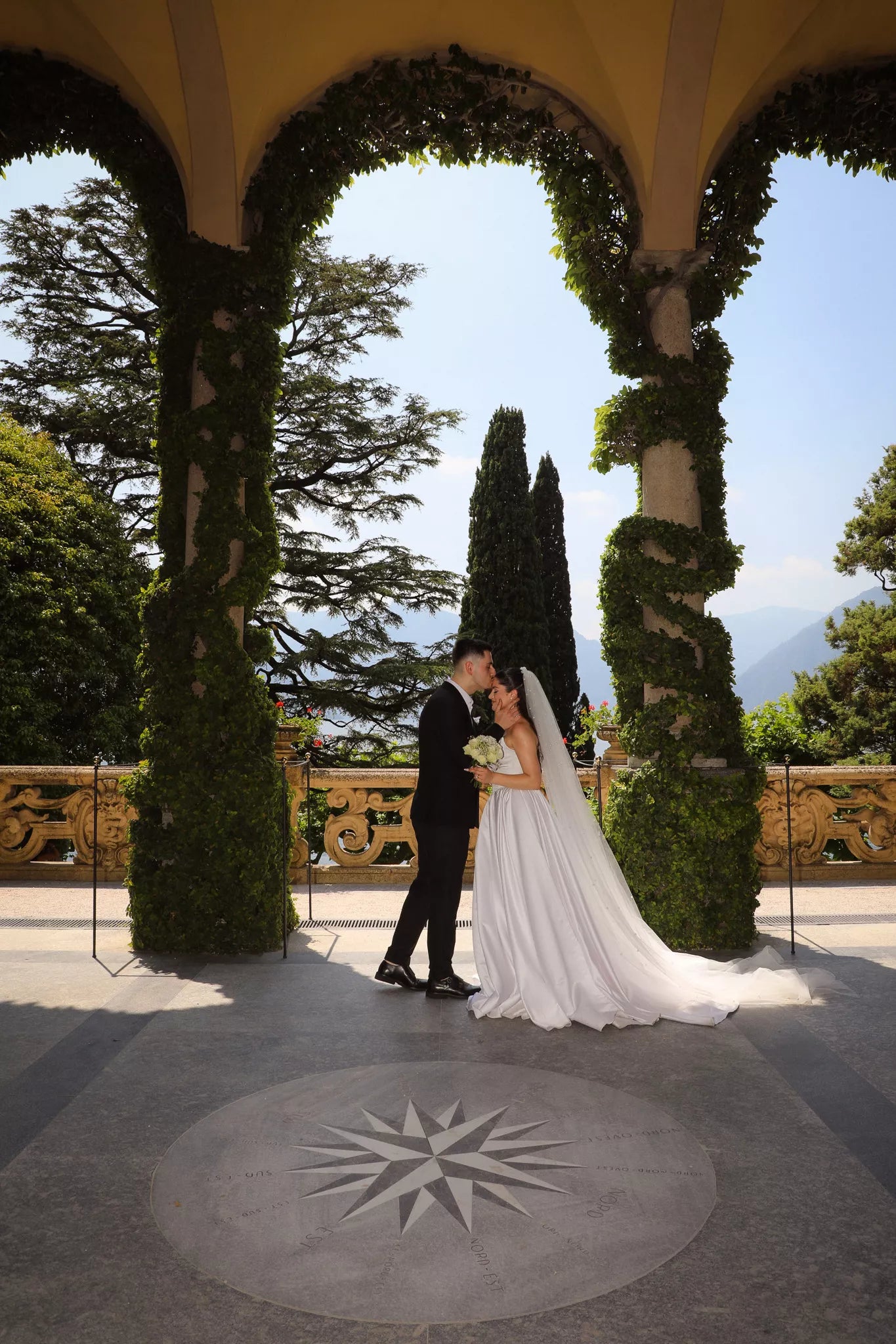 Luxury Lake Como wedding photographer capturing bride and groom portraits at Villa Melzi and Villa del Balbianello