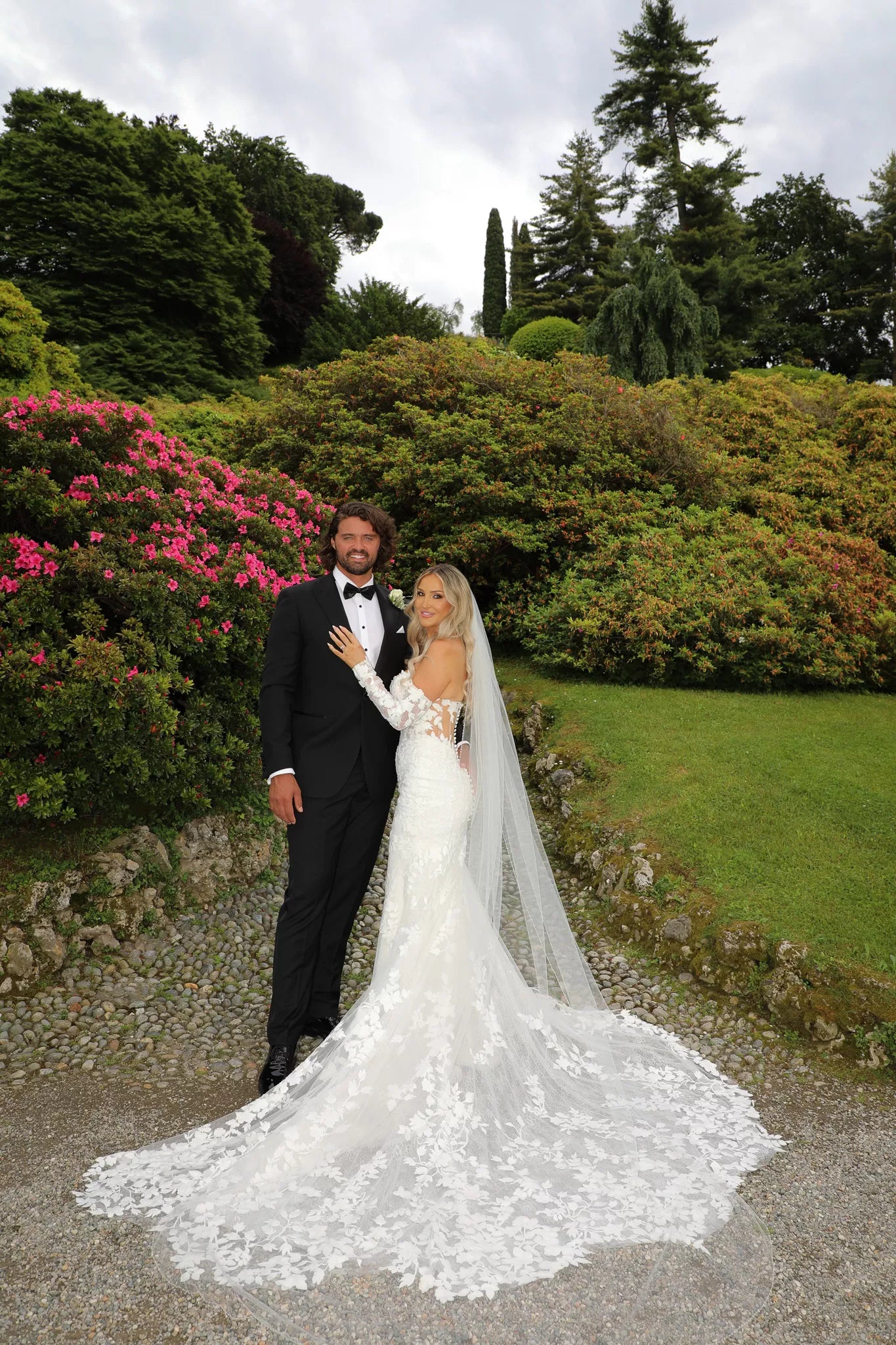 Lake Como wedding photographer capturing bride and groom portraits in the romantic gardens of Villa Melzi in Bellagio