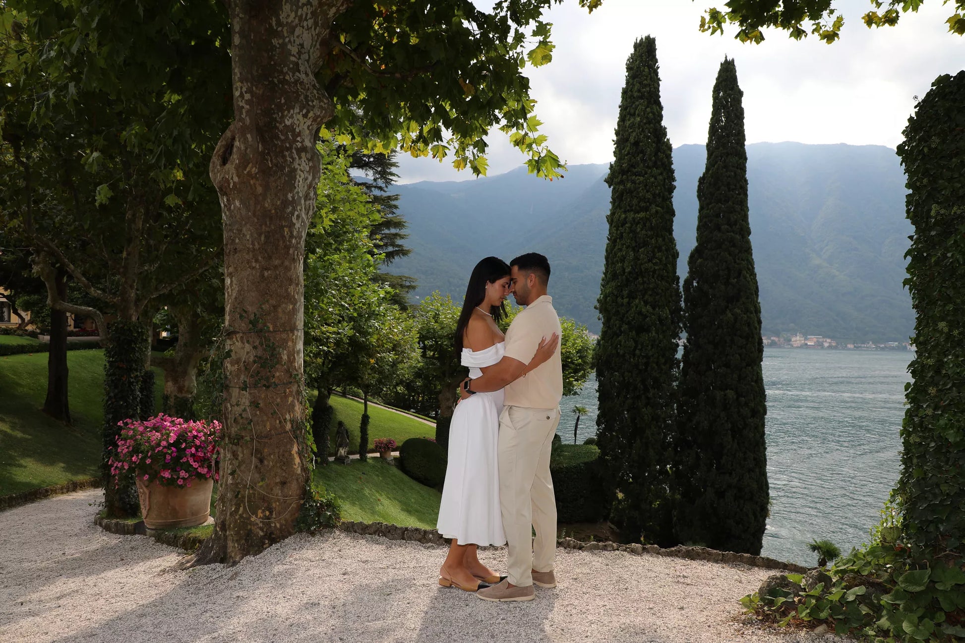 Villa del Balbianello engagement session with cypress trees and panoramic Lake Como views