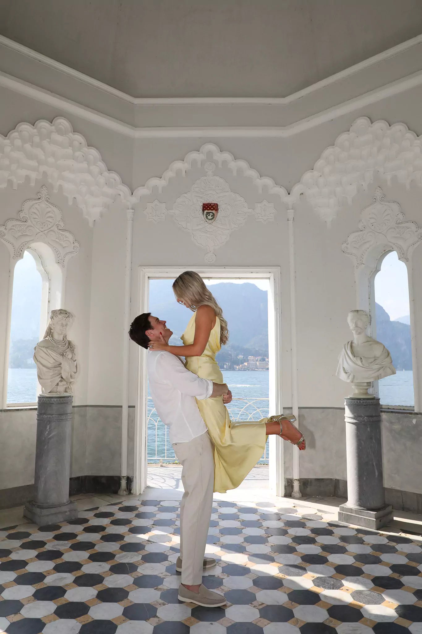 Lake Como proposal photographer capturing a couple in Villa Melzi Gardens, Bellagio.